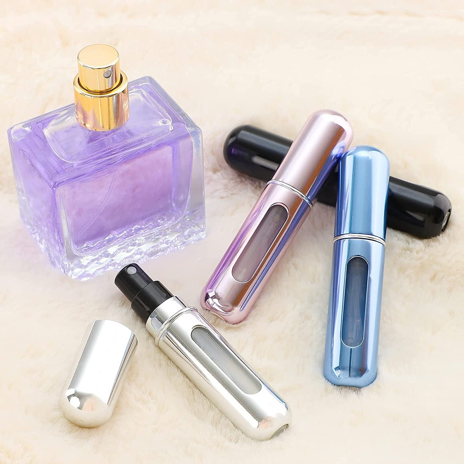 "Travel-Sized Perfume Atomizer: Refillable Mini Spray Bottle for Cosmetics on the Go!"